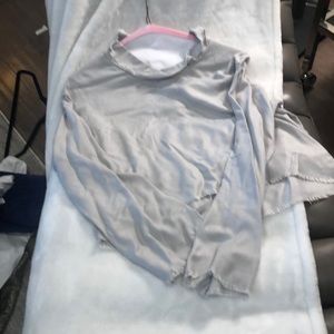 Grey clothe and stone blouse